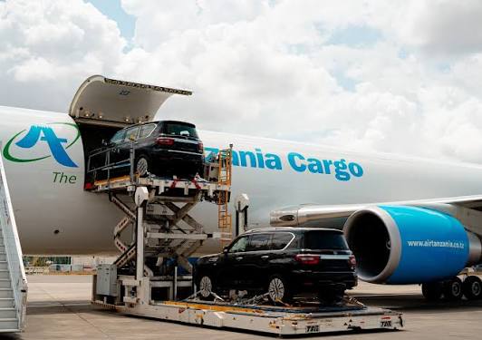 Vehicles being loaded into a cargo aircraft